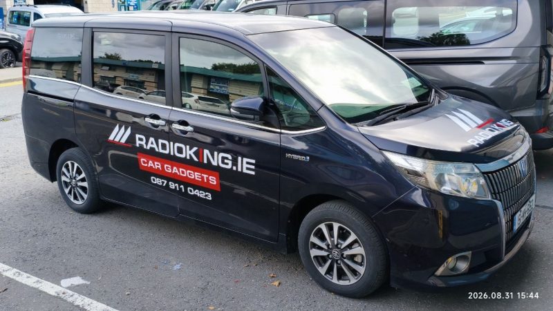 Custom vinyl logo and contact details applied to a business vehicle door